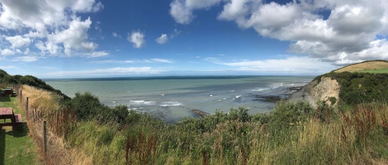 A panorama of the beach at Gilfach Holiday Village