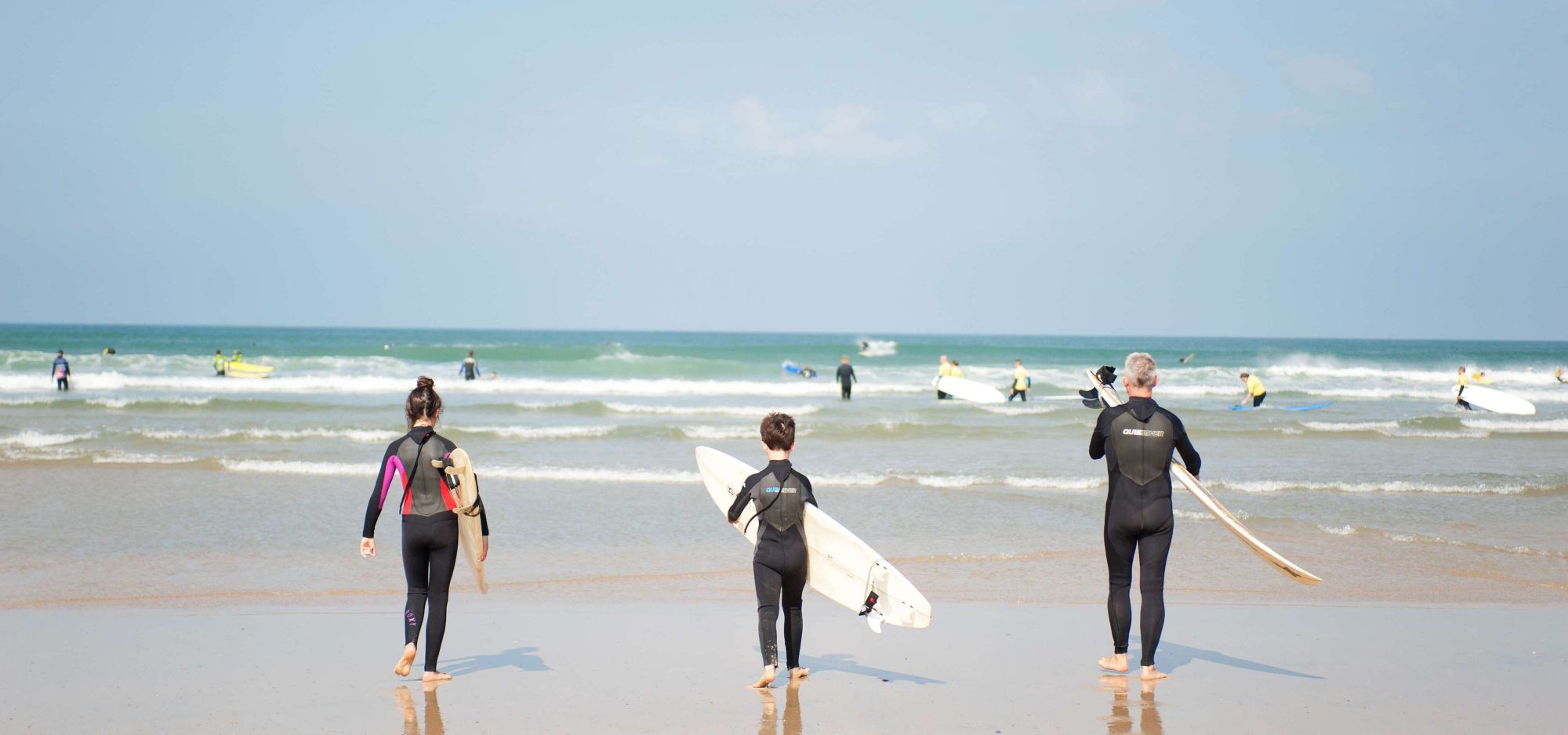 Surfers at the beach in Cornwall