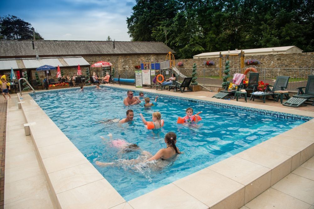 Families enjoying the outdoor pool at Grondre